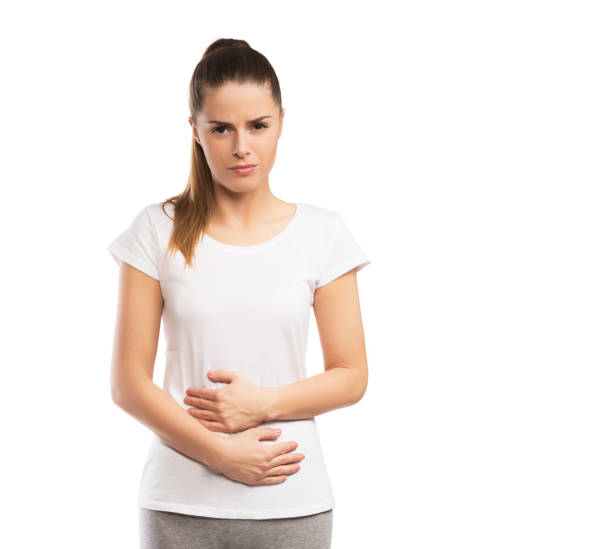 Woman having abdominal pain isolated on white