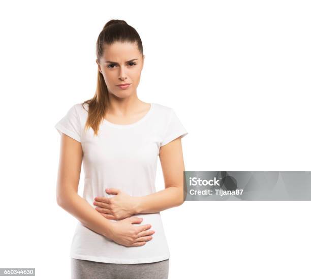 Woman Having Abdominal Pain Isolated On White Stock Photo - Download Image Now - Stomachache, Abdomen, One Woman Only