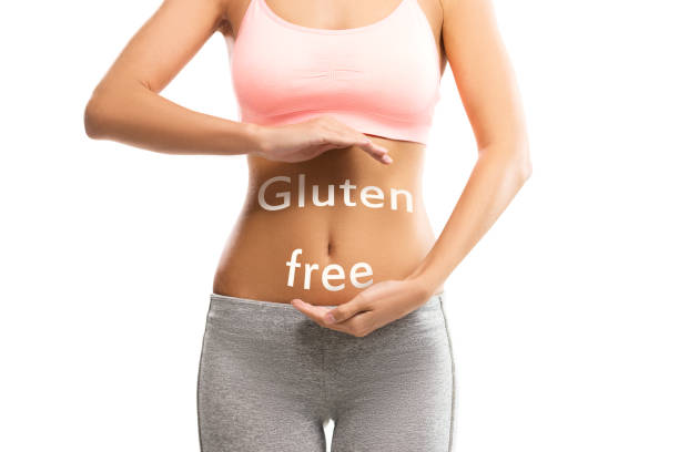 istock Female abdomen with a GLUTEN FREE text 660345516