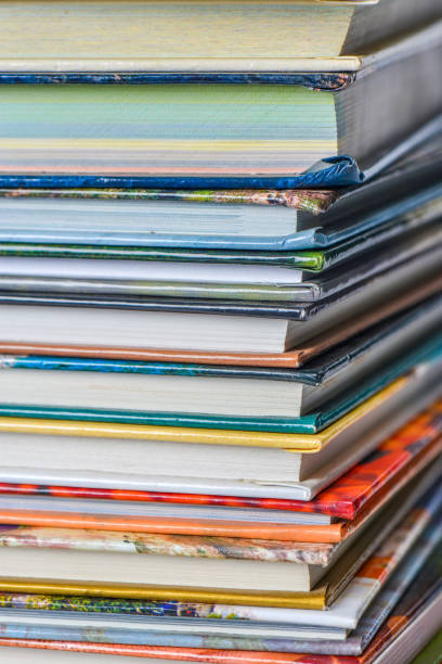 istock High angle view of many hardback books. Library or school 660347864