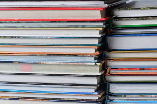 istock High angle view of many hardback books. Library or school 660351786