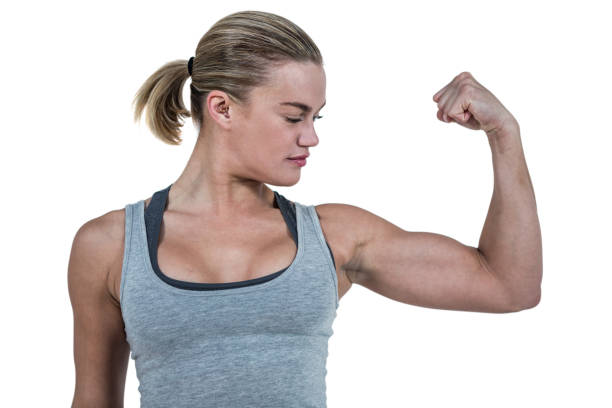 istock Serious muscular woman flexing muscle 660352972