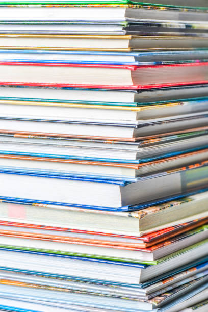 istock High angle view of many hardback books. Library or school 660353264