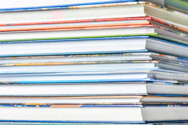 istock High angle view of many hardback books. Library or school 660356472