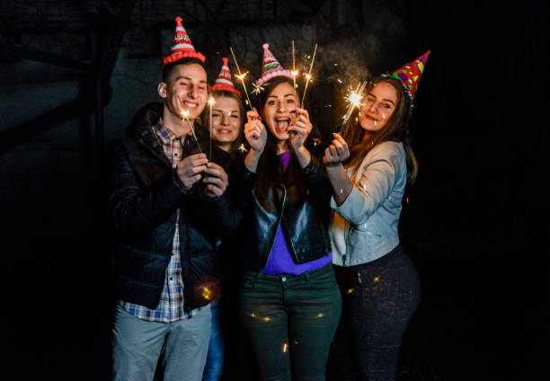 istock Sparklers in the hands for birthday party 660356952