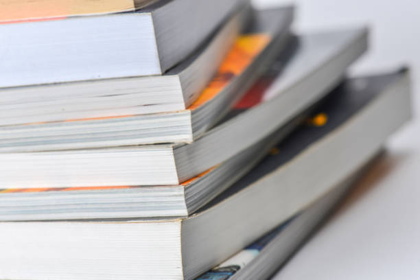 istock High angle view of many hardback books. Library or school 660359574