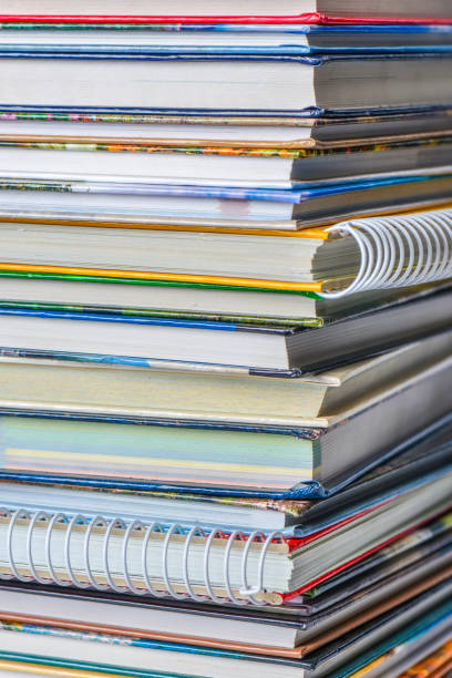 istock High angle view of many hardback books. Library or school 660360520