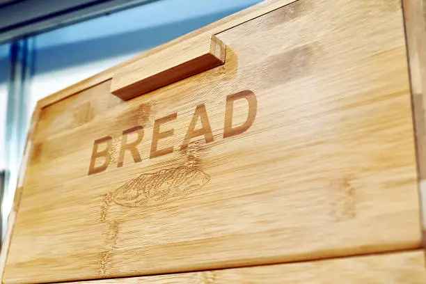 Wooden box for bread with text