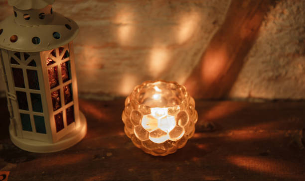 istock Light candles in glass cups 660370442