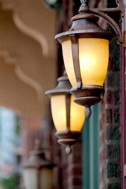 istock Light Posts Brick Walls City street 660374670