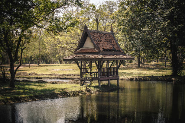 old  pavilion near river in park