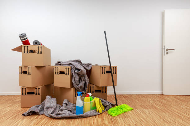 istock Clean, white room with cartons and cleaning tools 660386194