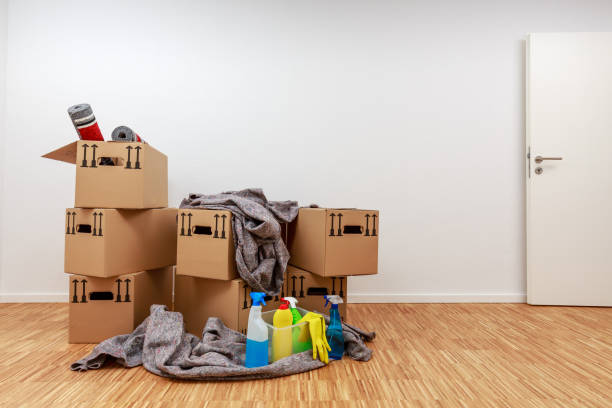 Apartment after moving in with fully packed moving boxes stock photo