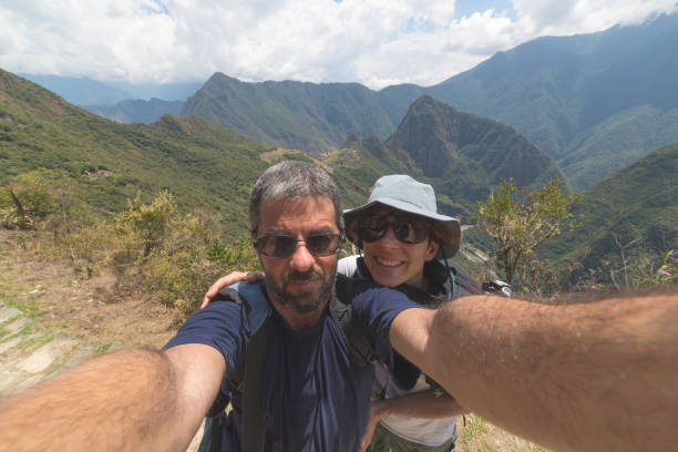 istock Couple taking selfie on the terraces above Machu Picchu 660391520