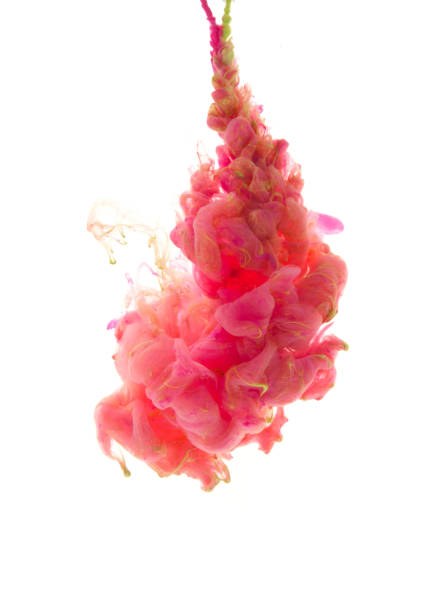 istock Colors dropped into liquid and photographed while in motion. Ink swirling in water. Cloud of silky ink in water isolated on white background. Colorful ink in water, an abstract banner. 660398606