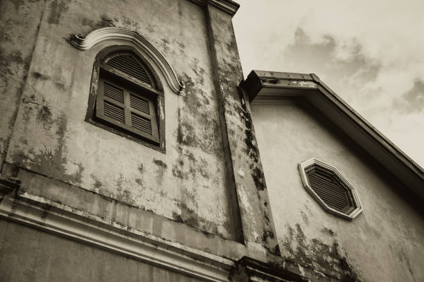 istock haunted and horror building windows retro aged gothic style house. 660399116