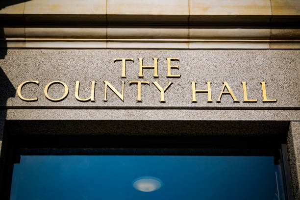 istock County Hall sign above doorway in gold lettering 660399120