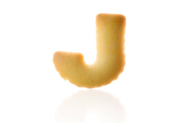 istock Letter J Cookie Biscuit english capital font isolated on white with path. 660405902