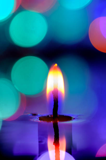istock Candle light in the water in the pool on the twilight. 660408666