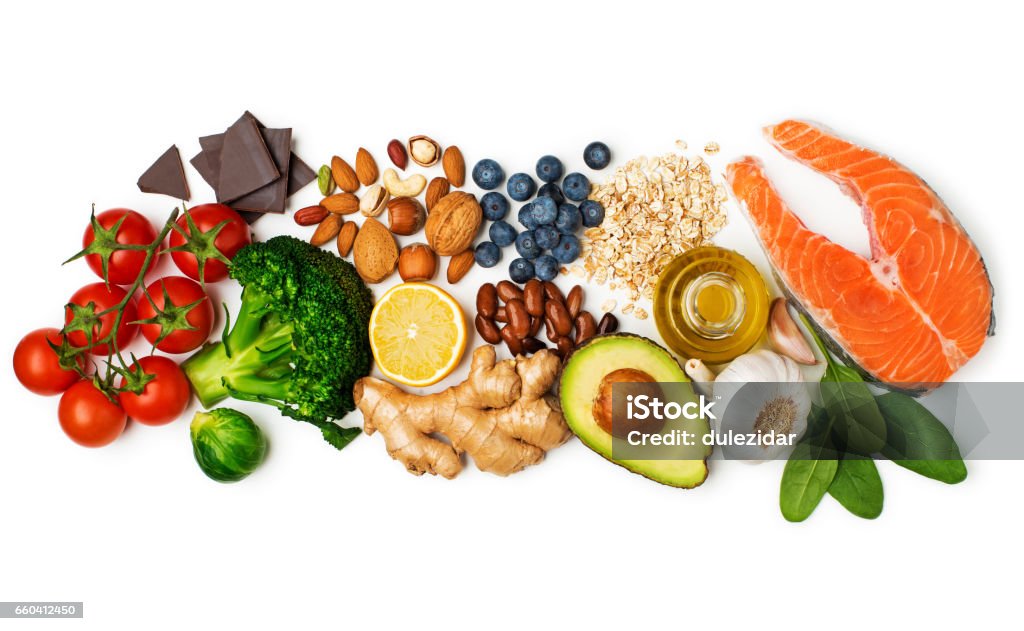 Healthy food Selection of healthy food on white background. Healthy diet foods for heart cholesterol and diabetes. Healthy Eating Stock Photo