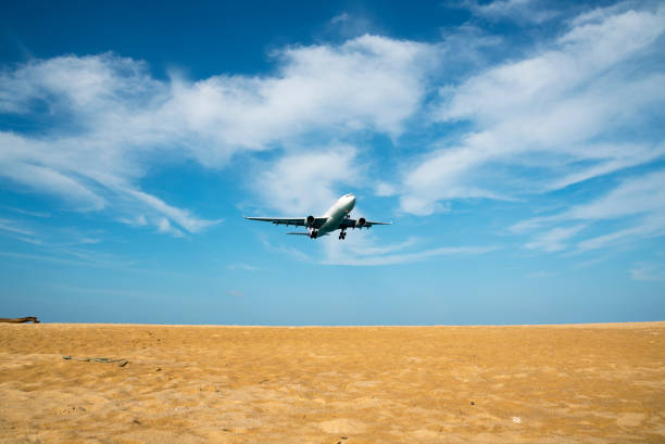 istock An airplane landing above Phuket beach 660416118