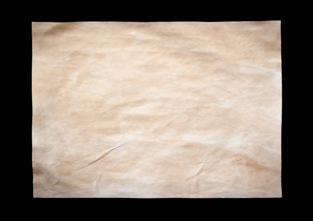 istock Old paper sheet isolated on black background 660419350