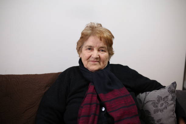 istock Senior Woman sitting at home 660422790