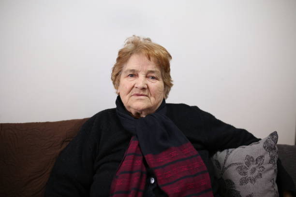 istock Senior Woman sitting at home 660422870