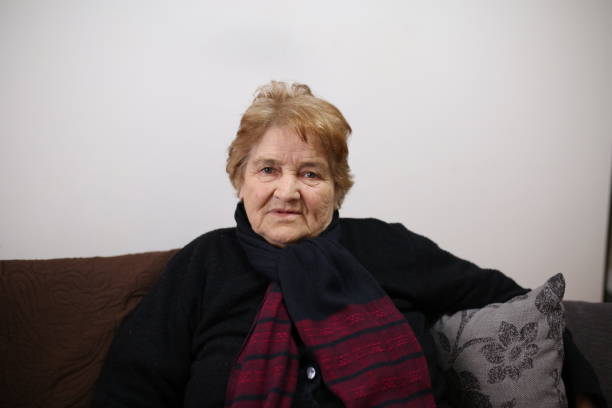 istock Senior Woman sitting at home 660422940