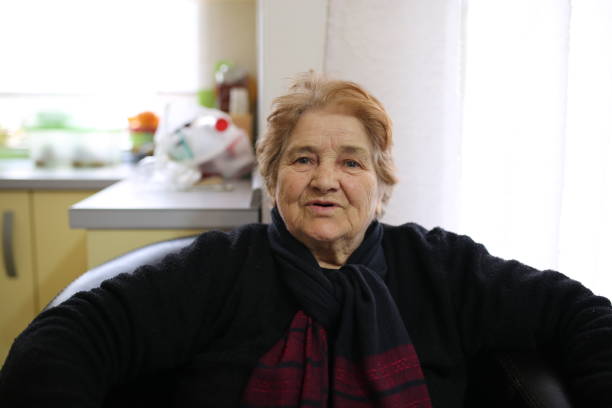 istock Senior Woman sitting at home 660422990