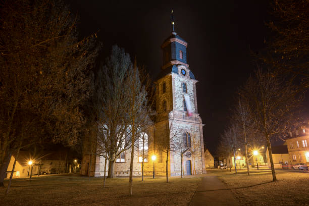 istock evangelical church langenselbold germany at night 660425244
