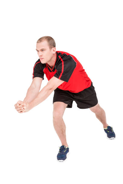 istock Sportsman posing while playing volleyball 660428644