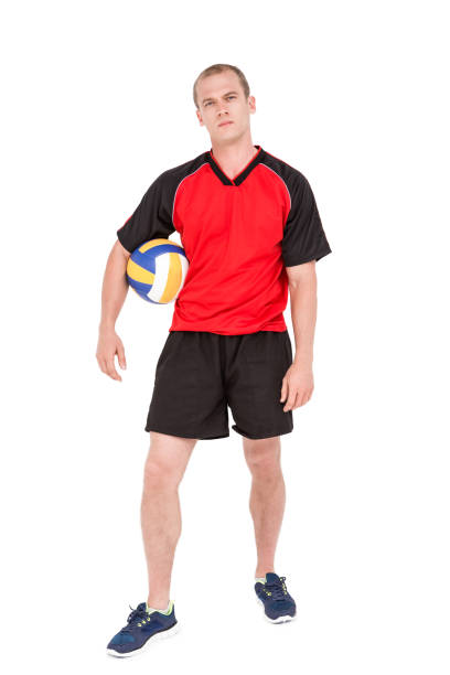 istock Sportsman holding a volleyball 660428700