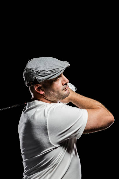 istock Portrait of golf player taking a shot 660429140