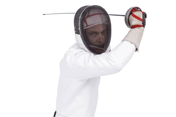 istock Man wearing fencing suit practicing with sword 660429444