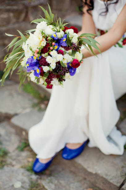 istock Beautiful bouquet in bride's hands 660429732
