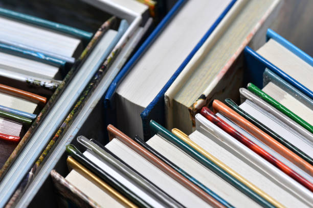 istock High angle view of many hardback books. Library or school 660429988