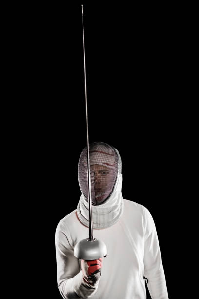 istock Man wearing fencing suit practicing with sword 660434466