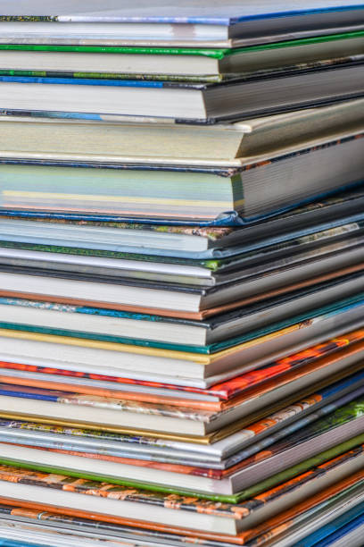 istock High angle view of many hardback books. Library or school 660434782