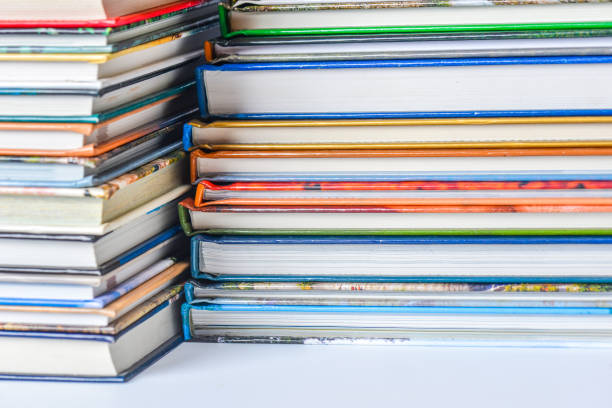 istock High angle view of many hardback books. Library or school 660435586
