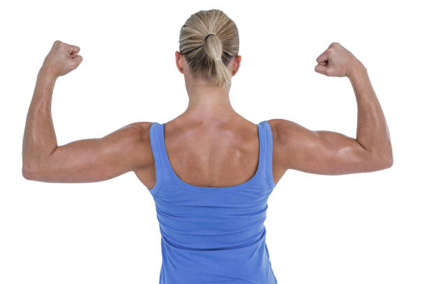 istock Rear view of woman flexing muscles 660445966