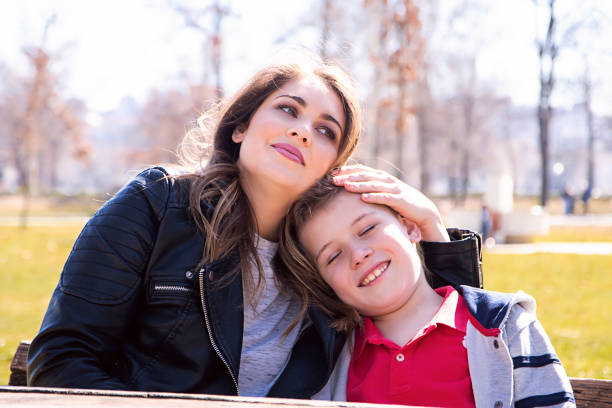 istock Mother and son in the park 660448510