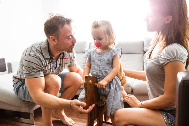 istock little kid playing with the family 660449440