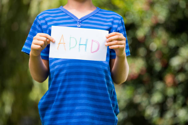 istock Portrait of young boy holding a message 660452524