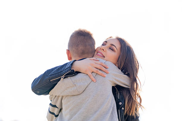 istock Happy little boy hugging his mother 660452586