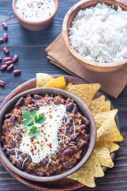 istock Bowl of chili con carne with white rice 660461726