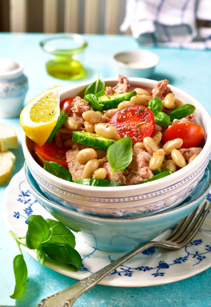 istock Vegetable salad with tuna and herbs 660462308