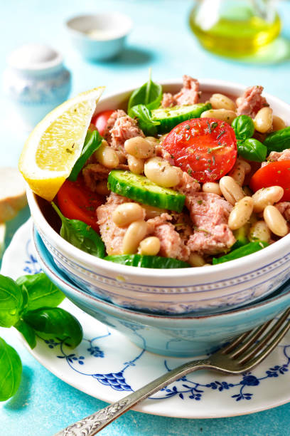 istock Vegetable salad with tuna and herbs 660462438