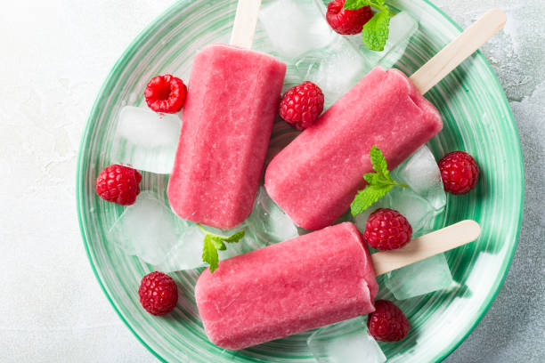 istock Homemade strawberry popsicles 660471508