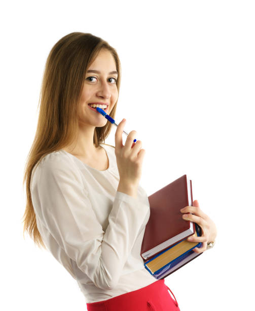 istock Young student girl with books 660488958